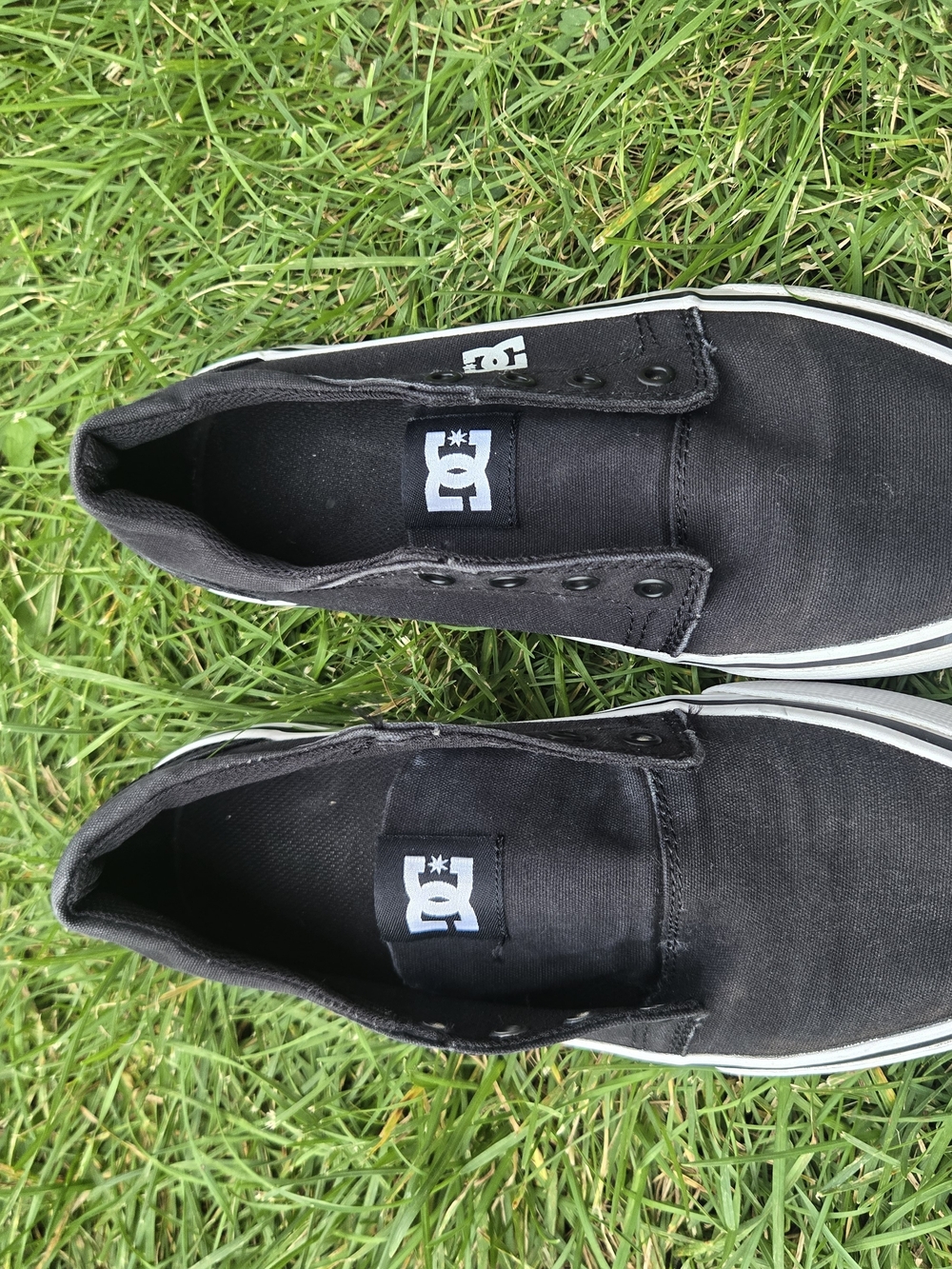 DC Black Canvas Slip-On Sneakers